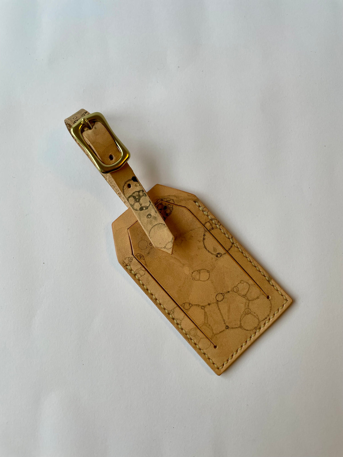 Leather bag tag bubbles